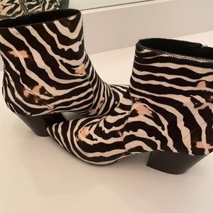 All Saints Zebra striped with pink touches.